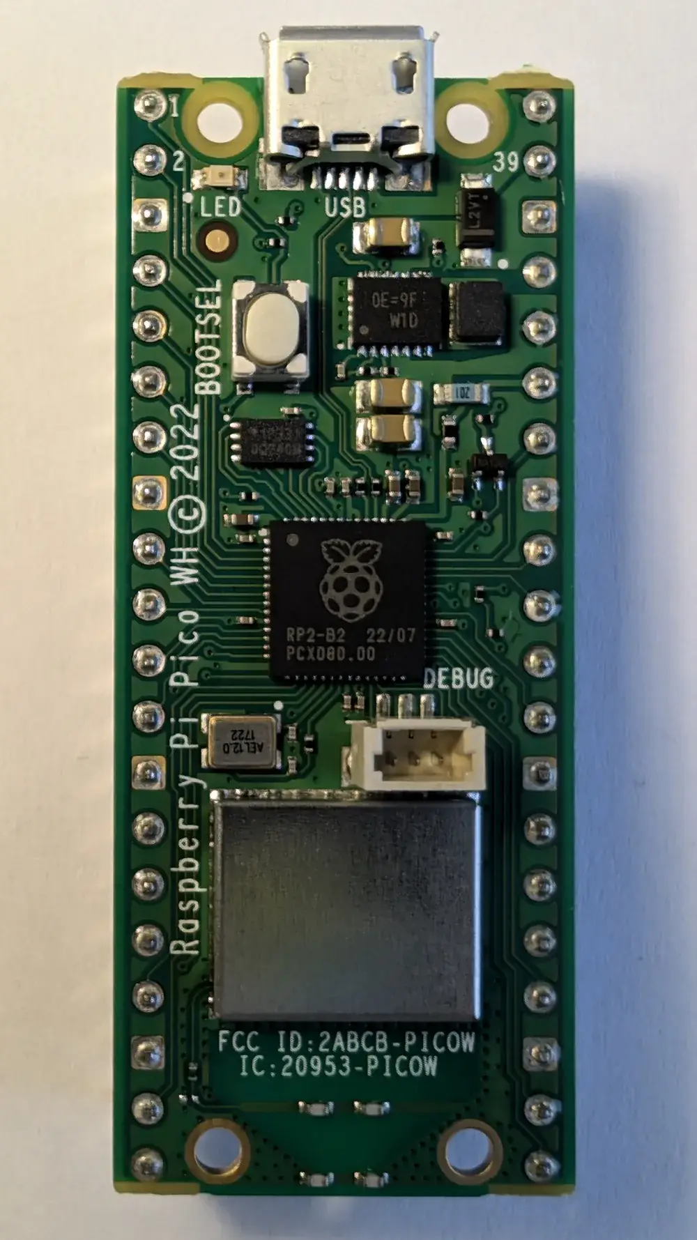 A Raspberry Pi Pico W with soldered header pins